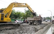 Dinas SDABMBK Tingkatkan Saluran Drainase Jalan Jermal VII