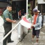 Babinsa Petisah Hulu Himbau Warga Memasang Bendera Merah Putih Menyambut HUT RI Ke-78
