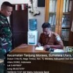 Babinsa Koramil 0201-16/TM Serda Fitriyadi Tingkatkan Hubungan dengan Desa Naga Timbul Melalui Kegiatan Rutin