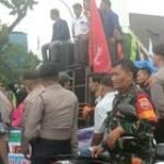 Babinsa Koramil 0201-16/TM Sertu Nurwahyudi Monitoring Aksi Unras Dari GEBBRAK