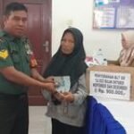 Pemerintah Respon Kebutuhan Hidup Sulit di Percut Sei Tuan dengan Program BLT, Babinsa Mendampingi Pembagian di Desa Bandar Klippa