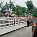 Babinsa Koramil 0201-05/MB Kodim 0201/Medan Sertu Ach Taufik Pantau Unjuk Rasa GODAMS di Kantor Gubernur Sumatera Utara