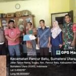 Babinsa Desa Sugau Serda S Tarigan Dampingi Penyaluran BLT & Dana Desa