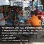 Peningkatan Hubungan dan Silaturahmi: Babinsa Kelurahan Deli Tua Timur Melaksanakan Komsos di Kedai Kopi Bapak Sitorus Ling II