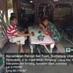 Jalin Hubungan Baik, Babinsa Serda Ade Agustian Lakukan Komsos Warung Pak Udin