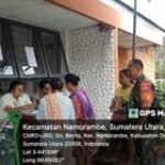Babinsa 0201-14/PB Dampingi Penyaluran Bantuan Pangan Cadangan Beras Untuk Warga Desa Suka Mulia Hulu