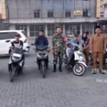Babinsa dan Tokoh Masyarakat Pantau Pos Pam Asmara Subuh di Simpang Cemara, Medan Timur