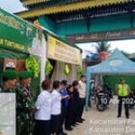 Babinsa Koramil 0201-14/PB Serma A. Pardede dan Serda S. Manurung Pos Pam Lebaran 1445 Hijriah