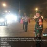 Babinsa Koramil 0201-16/TM Pos Pengamanan Mudik Liburan Idul Fitri 1445 H di Jalan Lintas Medan-Lubuk Pakam