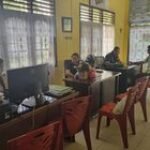 Antisipasi Banjir: Babinsa Kelurahan Gaharu Bersama Perangkat Kelurahan Beraksi