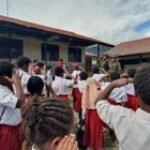 Satgas Yonif 323 Kostrad Bangun Nasionalisme di Generasi Muda Papua Lewat Baris Berbaris