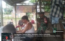 Babinsa Koramil 0201-14/PB Koptu Janawari Jalin Keakraban dengan Warga di Warung Kopi Desa Hulu