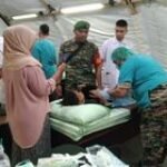 Babinsa Koramil 0201-11/MD Dampingi Warga dalam Kegiatan Sunat Massal HUT TNI Ke-79