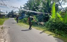 Babinsa Koramil 0201-12/Hamparan Perak Ajak Warga Gotong Royong Bersihkan Desa Klambir Lima Kampung