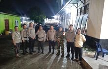 Babinsa Sertu Erlan Pastikan Pilkada di Martubung Berjalan Aman dan Lancar