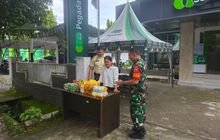 Babinsa Kelurahan Gaharu Laksanakan Komsos dengan Kantor Cabang Pegadaian