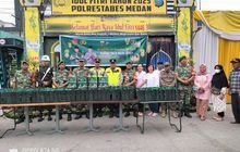 Sinergitas TNI-Polri, Kodim bersama Personil Kepolisian Bagikan Berkah