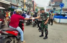 Danramil 0201-16/TM dan Kapolsek TM Bersama Personel dan Bhayangkari Bagikan Takjil di Tanjung Morawa
