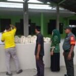 Sertu Erlinta Maya monitor pendistribusian perdana makan bergizi gratis SPPG Desa Percut Kec. Percut Sei Tuan