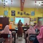 Kisah Inspiratif Nora Sirait, Dari Anak Petani ke Penulis AKMI Nasional