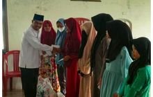 Kepala KUA Dolok Masihul Serahkan Zakat ASN
