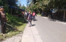 Babinsa Kotamil 0201-14/PB Melaksanakan Kegiatan gotong royong bersama-sama dengan masyarakat Di wilayah binaan