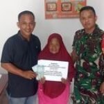 BABINSA KORAMIL 0201-14/PB SERDA ROMI SIDABALOK MELAKSANAKAN PENDAMPINGAN PENYALURAN BLT TAHUN 2025 DI DESA DURIN SIMBELANG