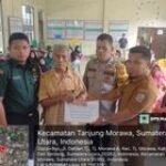 Babinsa Koramil 0201-16/TM Dampingi Penyaluran BLT Dana Desa di Tanjung Morawa A