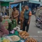 Babinsa Koramil 0201-05/DT Dampingi Penertiban PKL di Desa Binaan