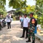 Babinsa 2 Bandar Labuhan Dampingi PasiTer Kodim 0201/Medan dalam Kegiatan Survei Lahan OPLAH